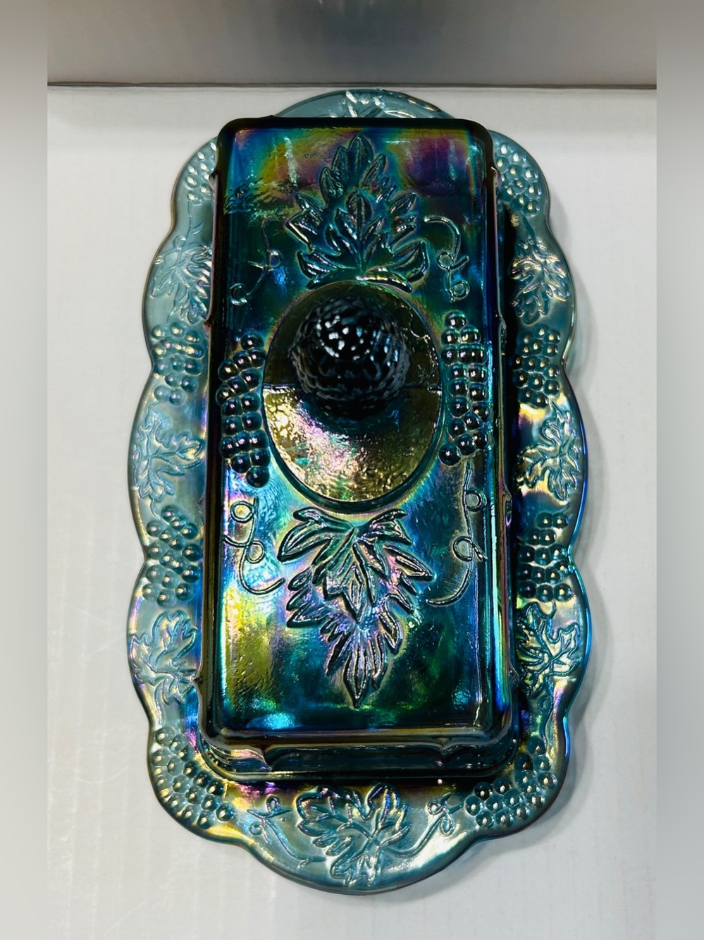 Vintage Indiana Glass butter dish. Iridescent blue carnival glass.